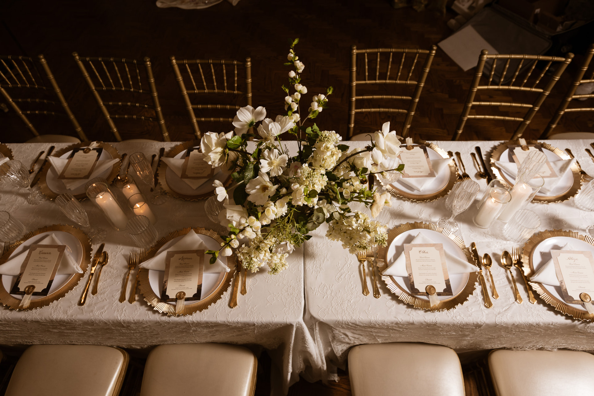 Overhead view of the tablescape with white floral centerpiece