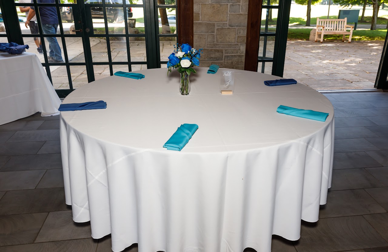 Round reception table styled in blue and white